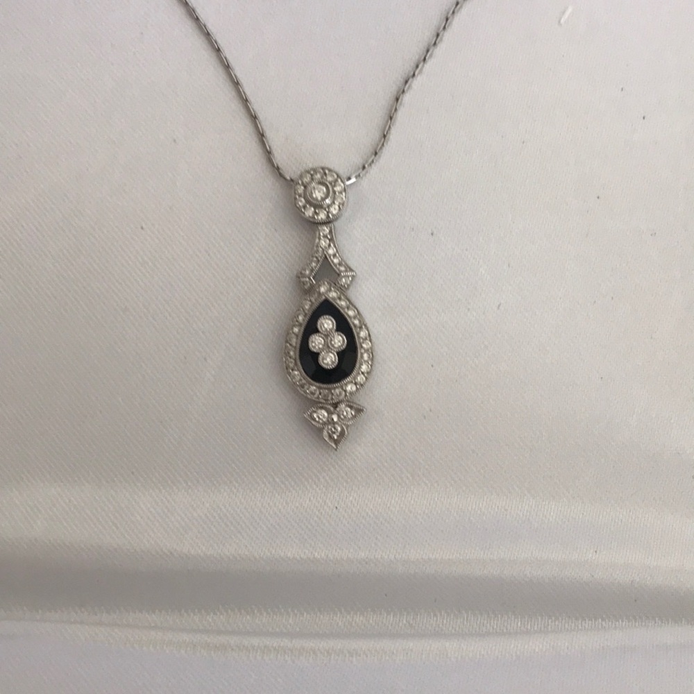 Black Onyx and diamond pendant.